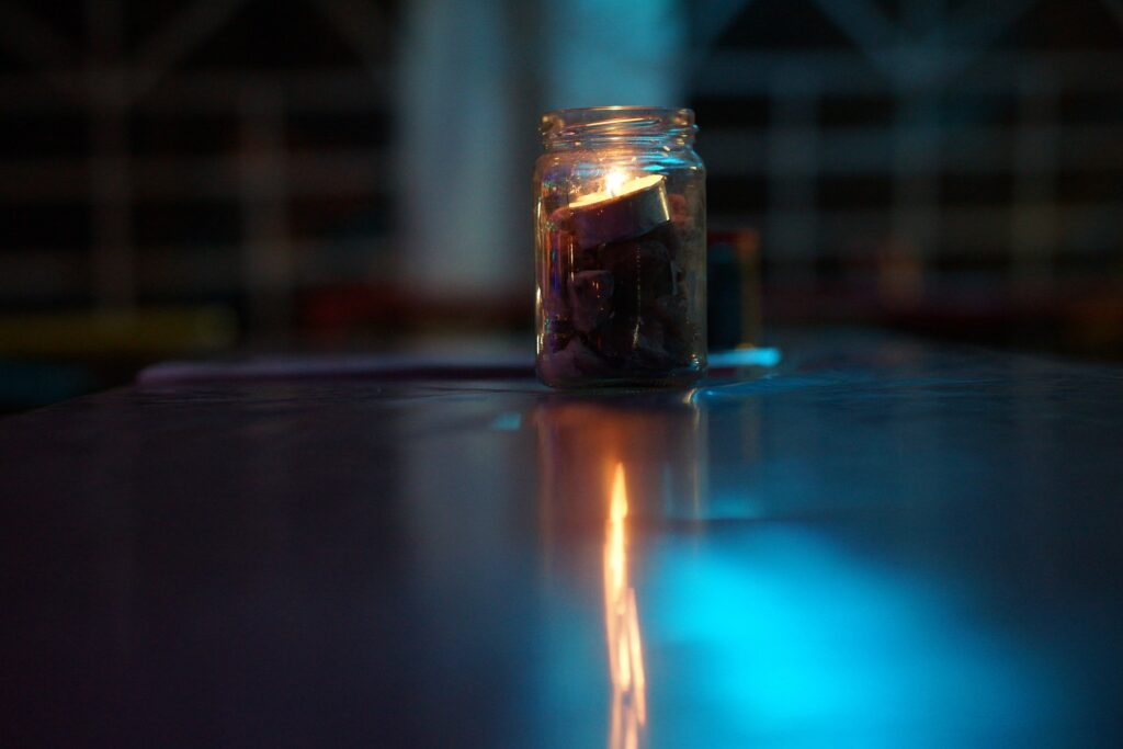 lit candle visualizing stepping into your light through career change